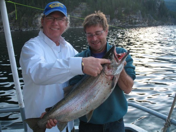 Dave Cassidy with buddy Pete Pankovich holding a large gerrard rainbow hen that weighed in at 21 LB. 2 oz
