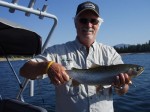 Rick with a four pound Wickiup rainbow...